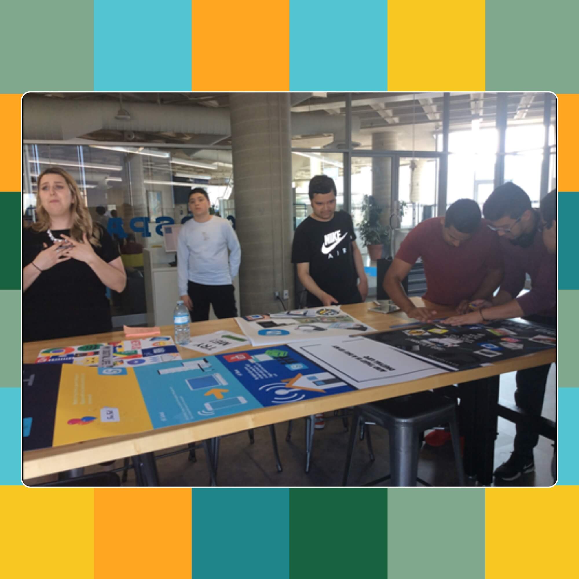 CLICK Researchers and collaborators working together at a table