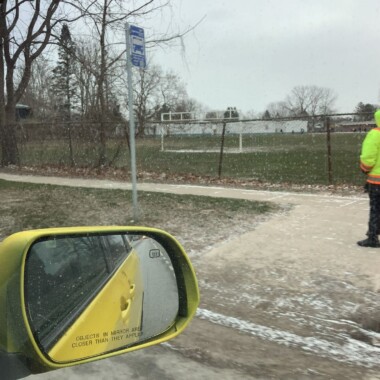 School crossing guard and a yellow mirror
